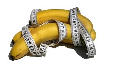 Banana and centimeters as penis imitation
